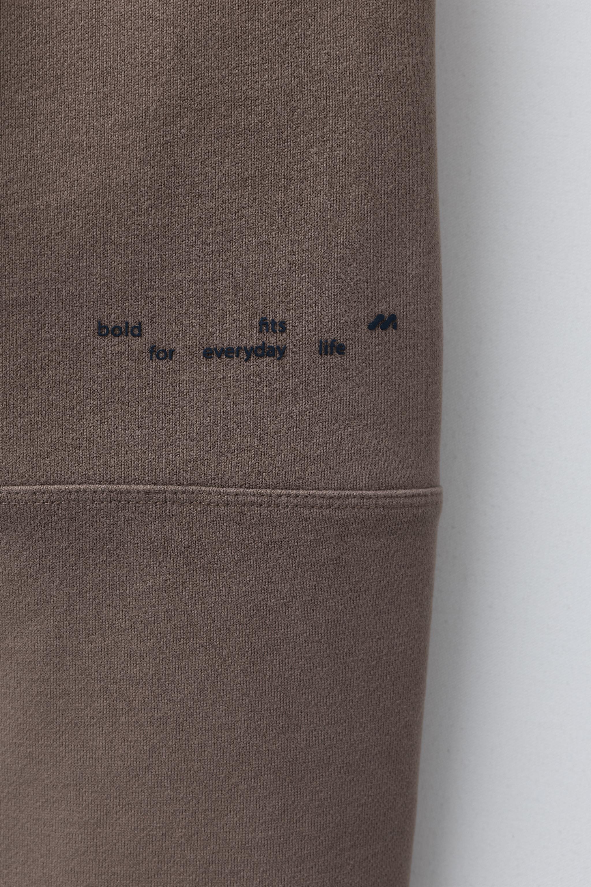 STRAIGHT PLUSH PANTS WITH RAISED LOGO